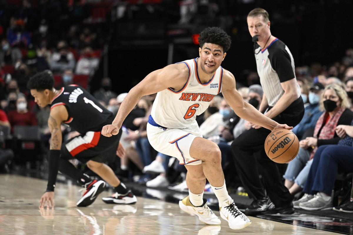 New York Knicks guard Quentin Grimes (6) steals the basket ball during the the second half against Portland Trail Blazers guard Anfernee Simons (1) at Moda Center.