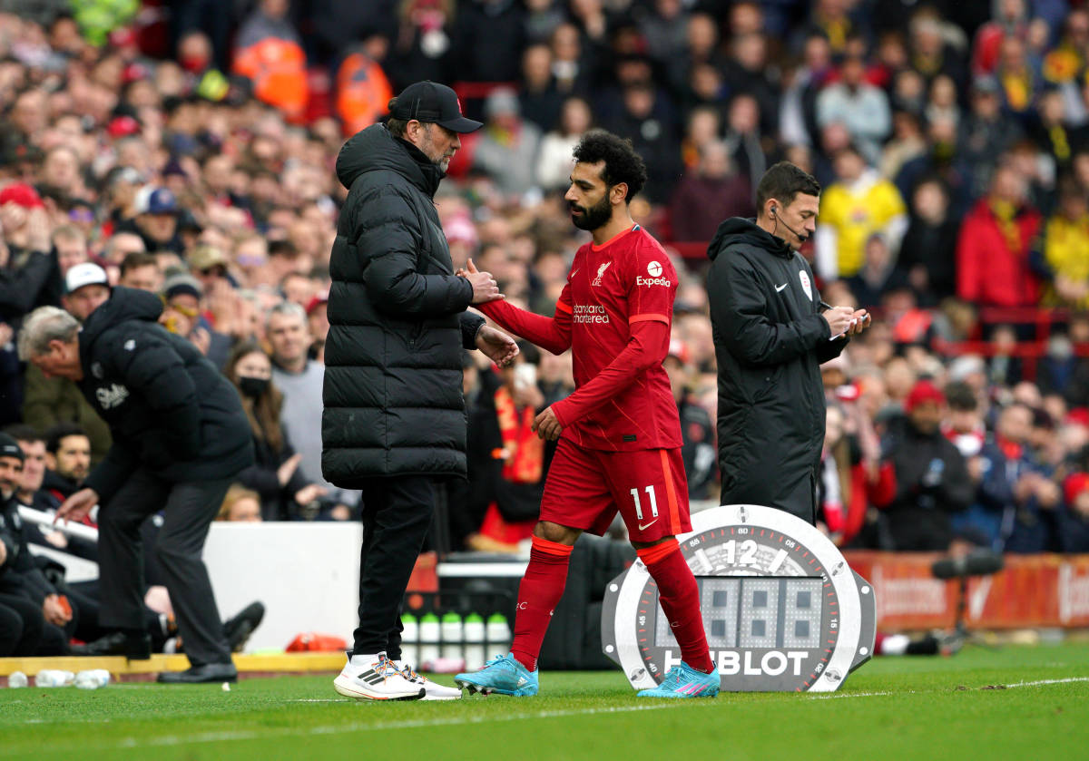 Mo Salah pictured shaking hands with Jurgen Klopp after being subbed off during Liverpool's win over Watford in April 2022