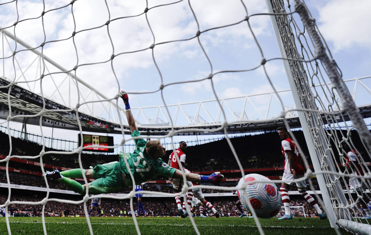 Arsenal goalkeeper Aaron Ramsdale is unable to stop a superb goal by Brighton midfielder Enock Mwepu