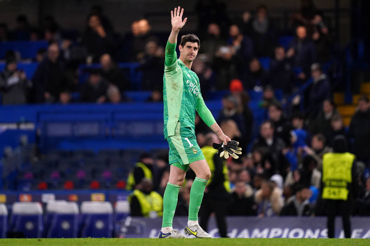 Thibaut Courtois acknowledges the Real Madrid fans at Stamford Bridge after a 3-1 win over Chelsea in April 2022