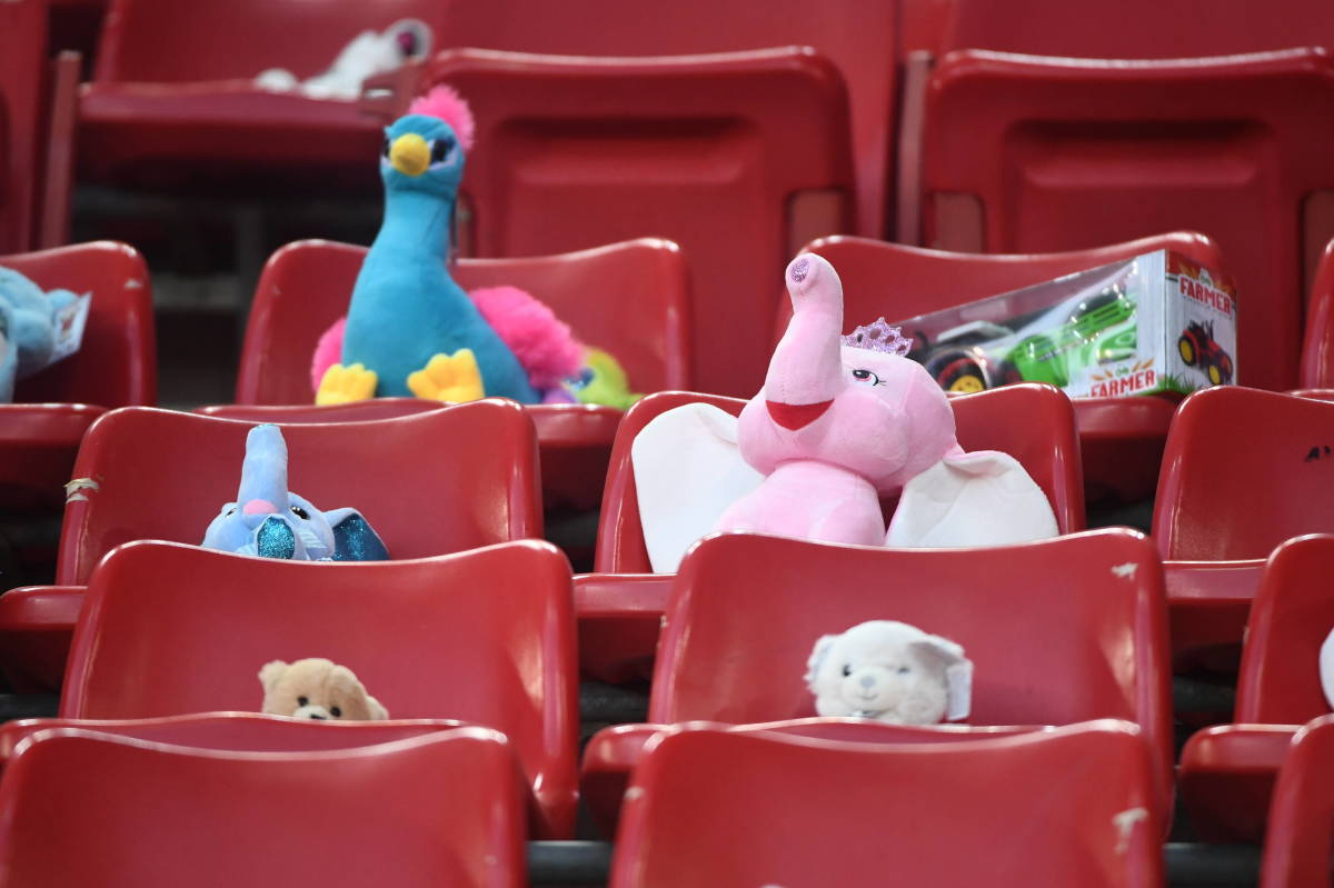 Toys fill seats during a Global Tour For Peace friendly between Shakhtar Donetsk and Olympiakos