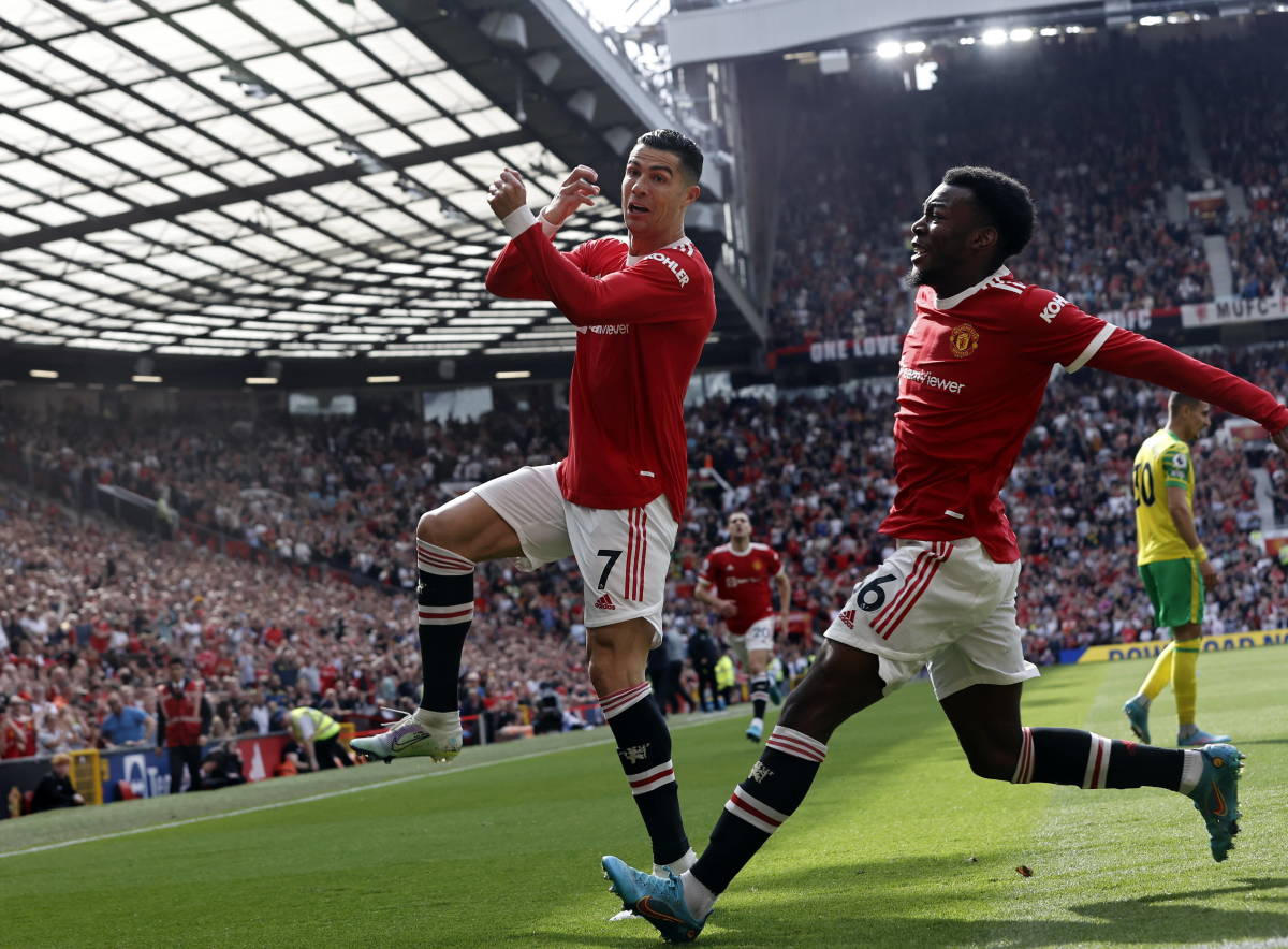 Cristiano Ronaldo (left) celebrates with Anthony Elanga after scoring for Manchester United against Norwich