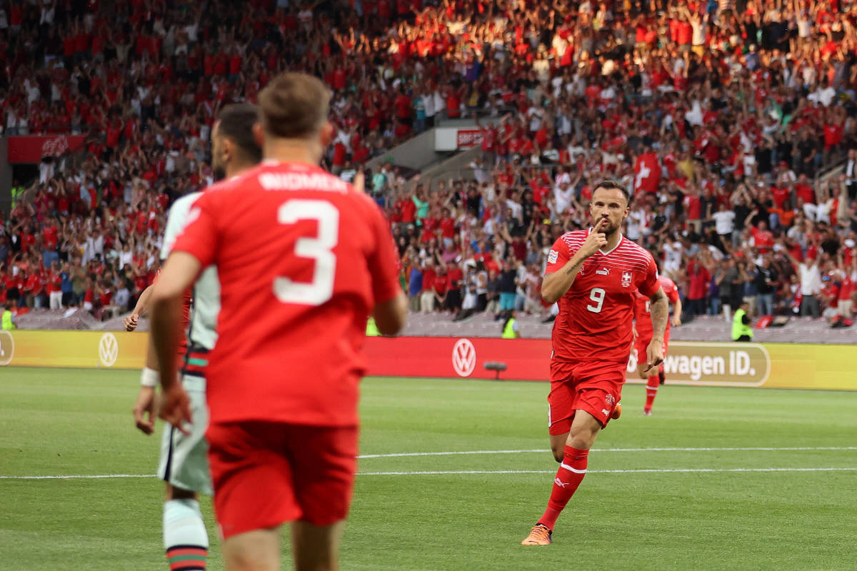 Haris Seferovic pictured (right) celebrating after scoring in Switzerland's 1-0 win over Portugal in June 2022