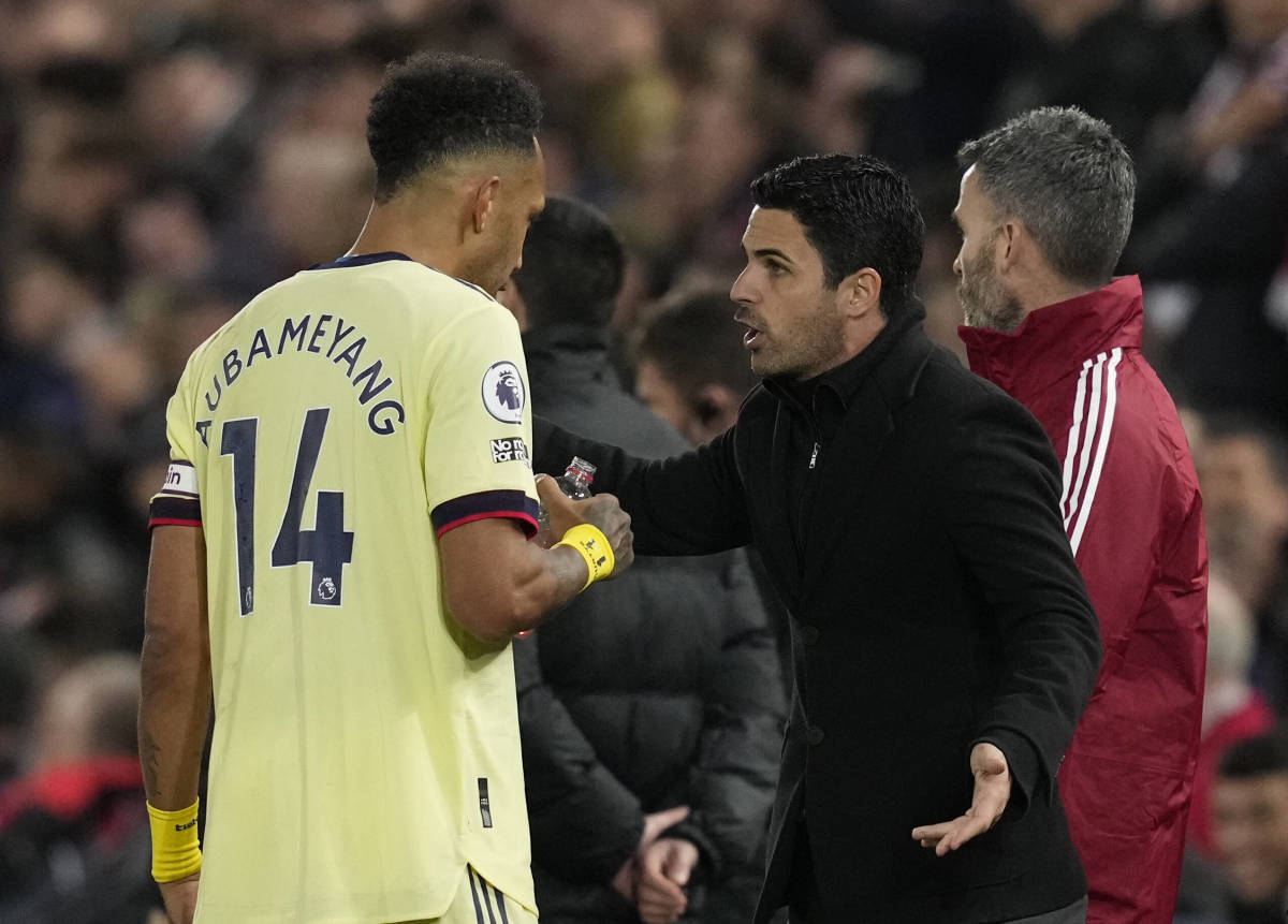 Pierre-Emerick Aubameyang and Mikel Arteta pictured in conversation during Liverpool vs Arsenal in 2021