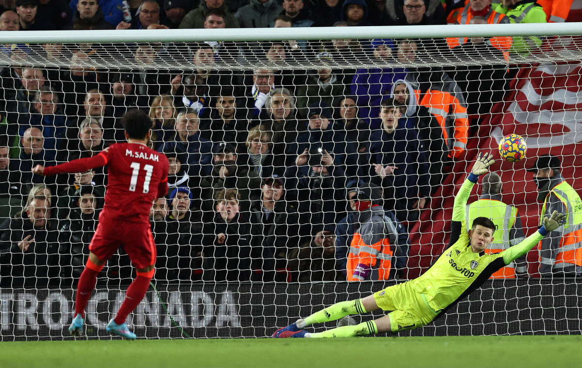 Liverpool's Mo Salah pictured converting a penalty kick past Leeds United goalkeeper Illan Meslier