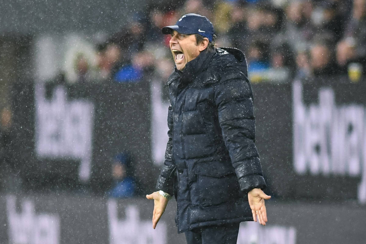 Antonio Conte screams in frustration as his Tottenham side lose to Burnley at a rainy Turf Moor