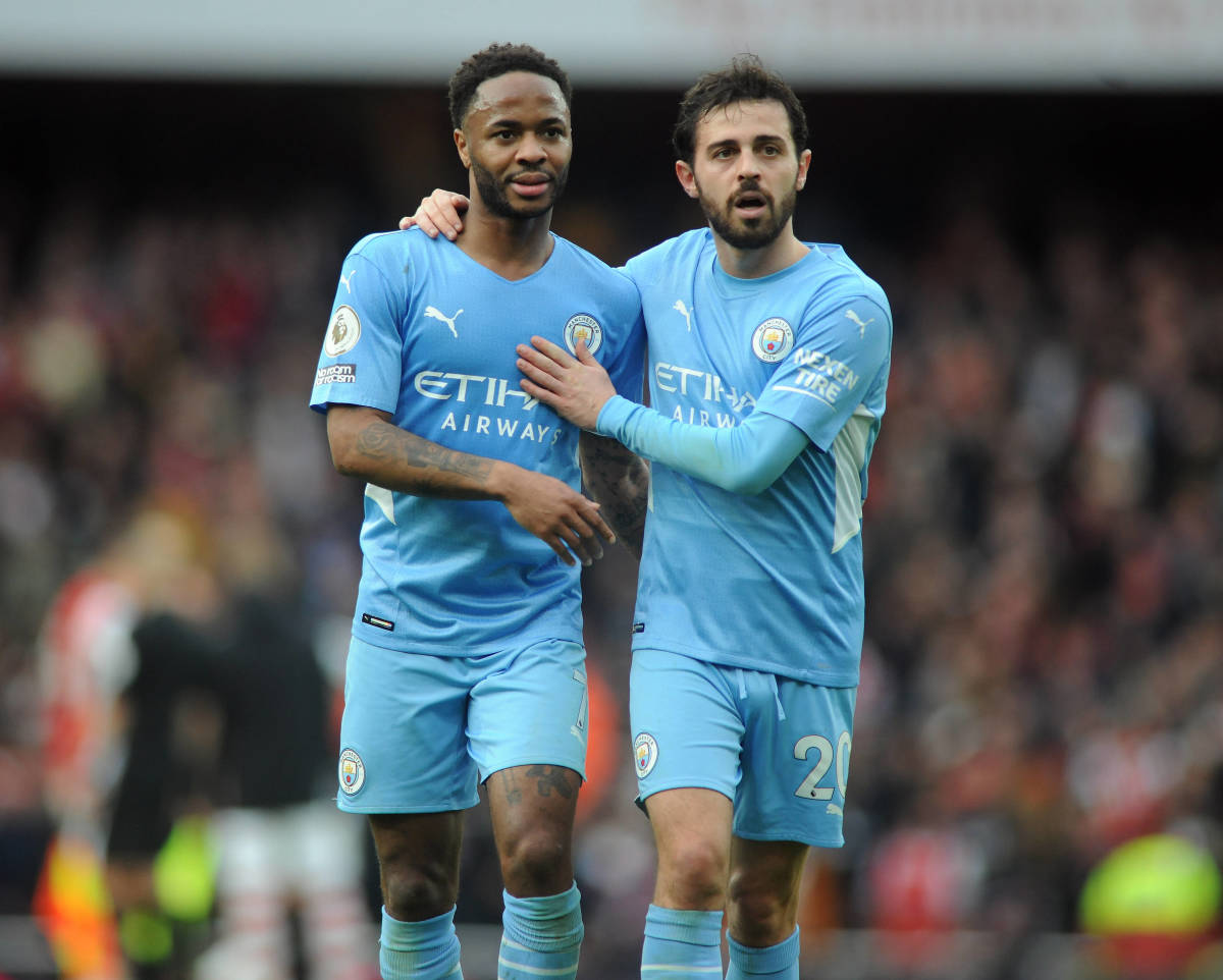 Raheem Sterling (left) and Bernardo Silva pictured playing for Manchester City in the 2021/22 season