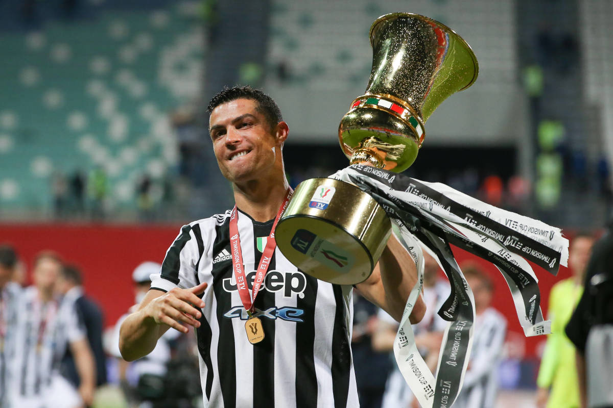 Cristiano Ronaldo pictured holding the Coppa Italia trophy after winning it with Juventus in 2021