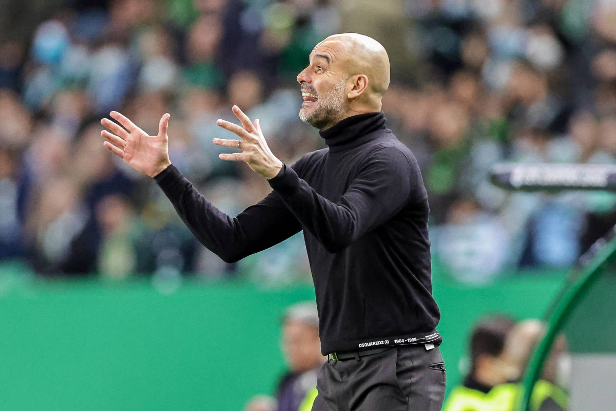 Pep Guardiola gestures from the sideline during Man City's 5-0 win at Sporting Lisbon in February 2022