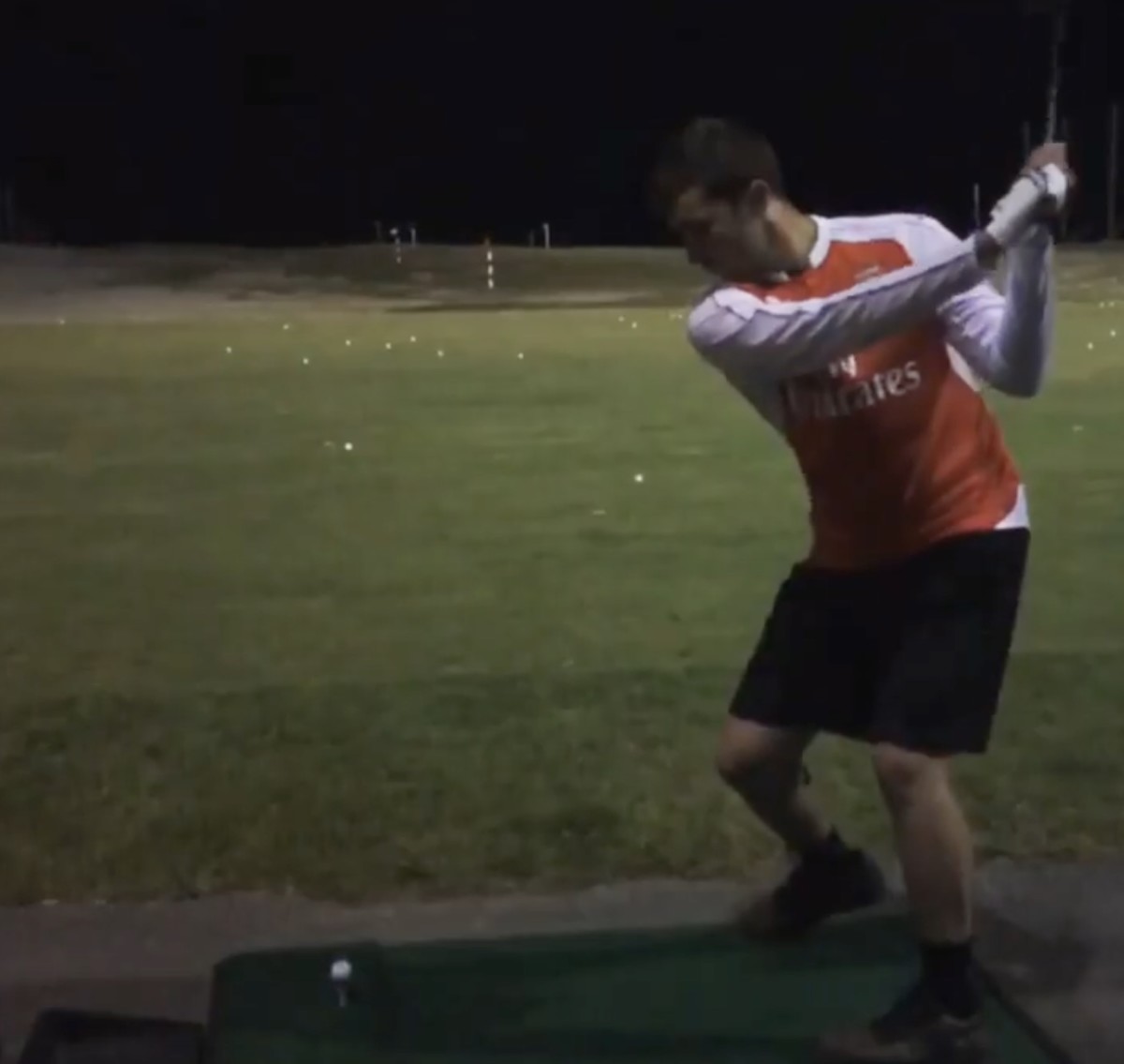 Matt Turner pictured playing golf while wearing an Arsenal jersey in 2016