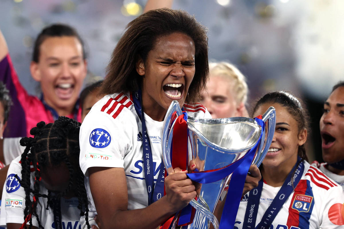 Lyon captain Wendie Renard pictured holding the UEFA Women's Champions League trophy in May 2022