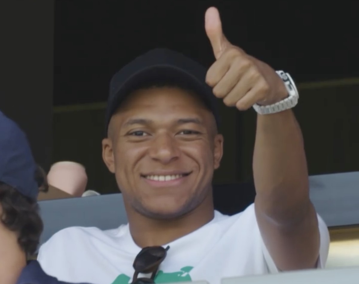 Kylian Mbappe pictured giving a thumbs up from the crowd during LAFC's 2-0 win over New York Red Bulls in June 2022