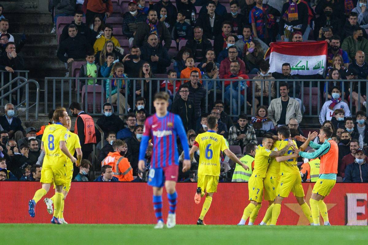 Cadiz players pictured celebrating at the Camp Nou after Lucas Perez scored in their 1-0 win over Barcelona in April 2022