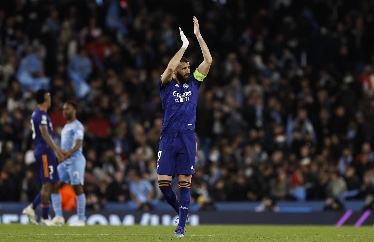Karim Benzema pictured applauding Real Madrid's traveling fans at the Etihad Stadium after his side's 4-3 loss in the first leg of their Champions League semi-final