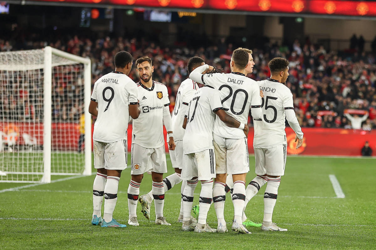 Manchester United's players celebrate after Anthony Martial (left) scored against Crystal Palace in a 2022 pre-season friendly at Melbourne's MCG stadium