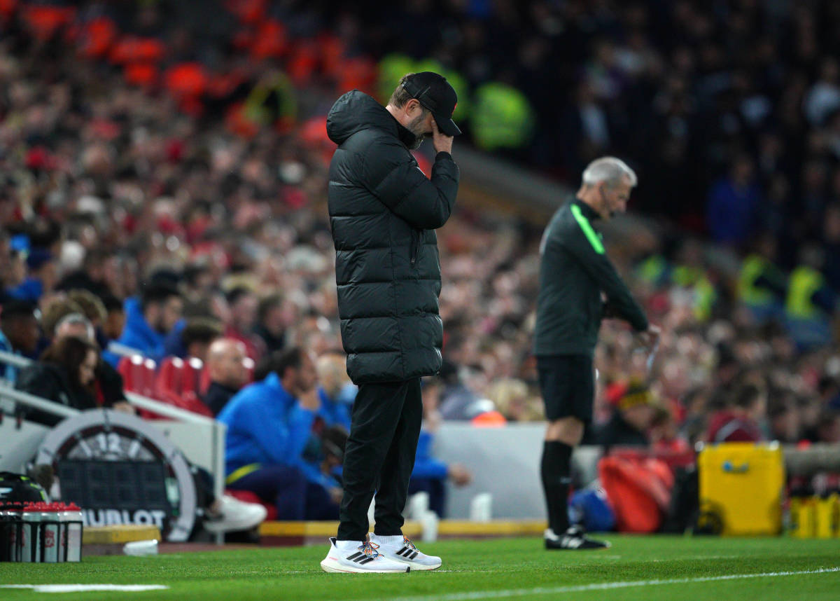 Jurgen Klopp pictured with his head in his hand during Liverpool's 1-1 draw with Tottenham in May 2022
