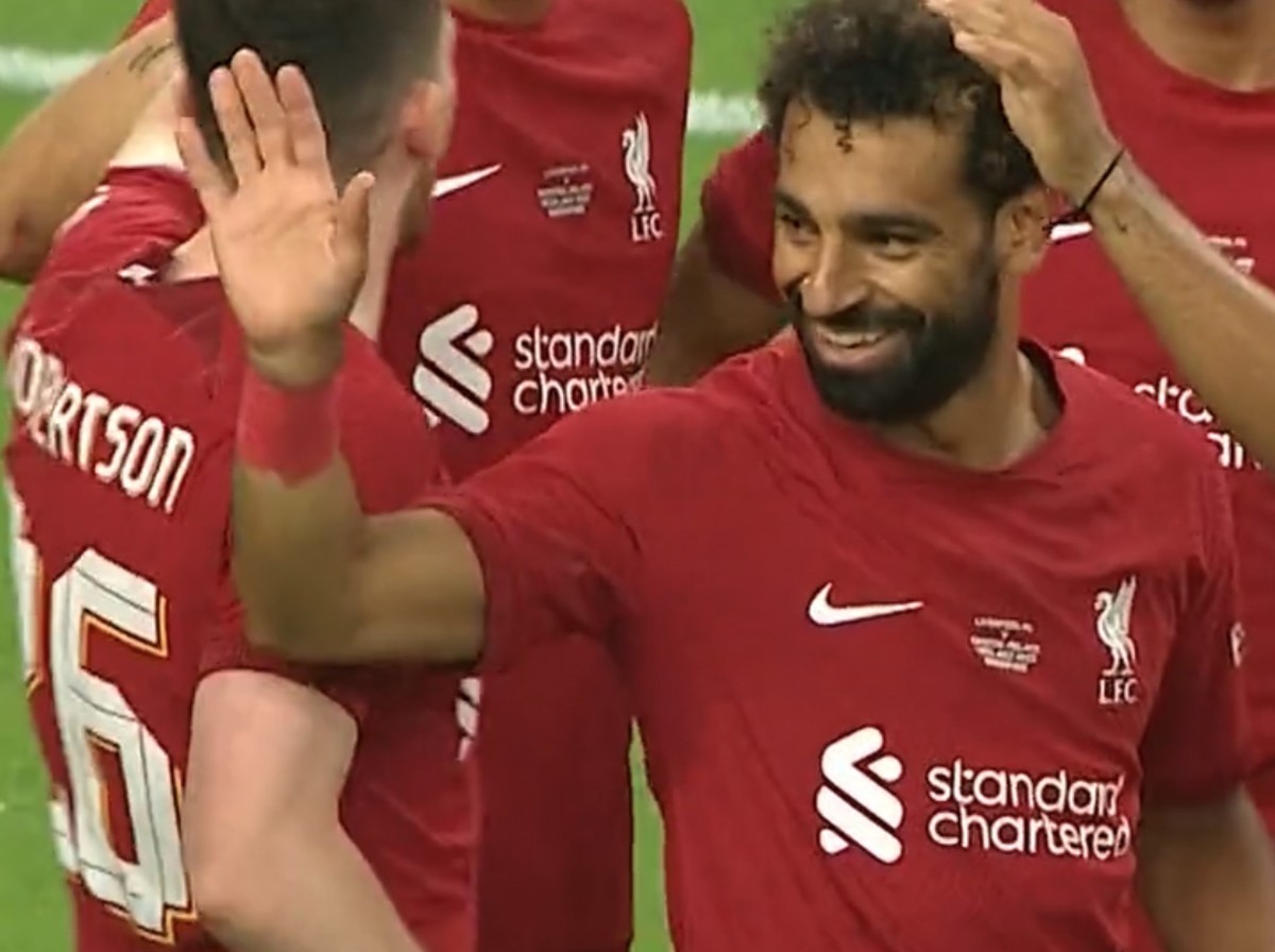 Mo Salah (right) pictured after scoring for Liverpool against Crystal Palace in a 2022 pre-season friendly