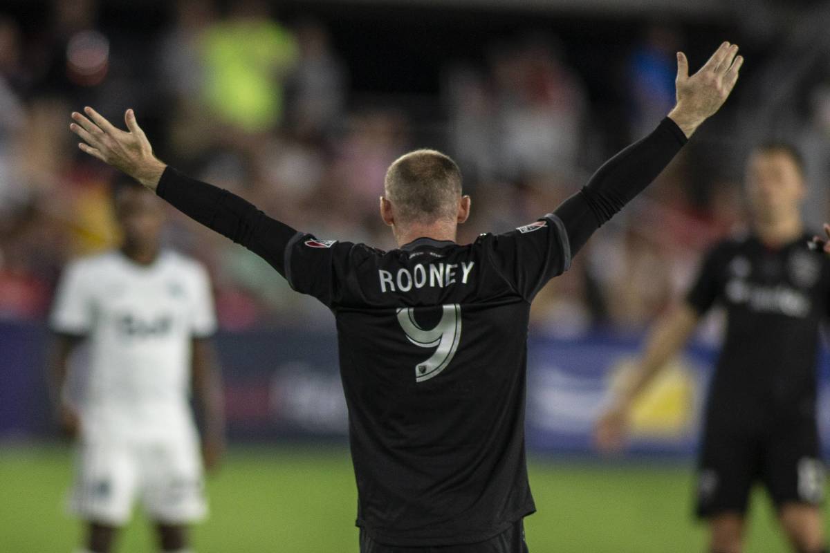 Wayne Rooney pictured celebrating after scoring a goal for DC United in 2018