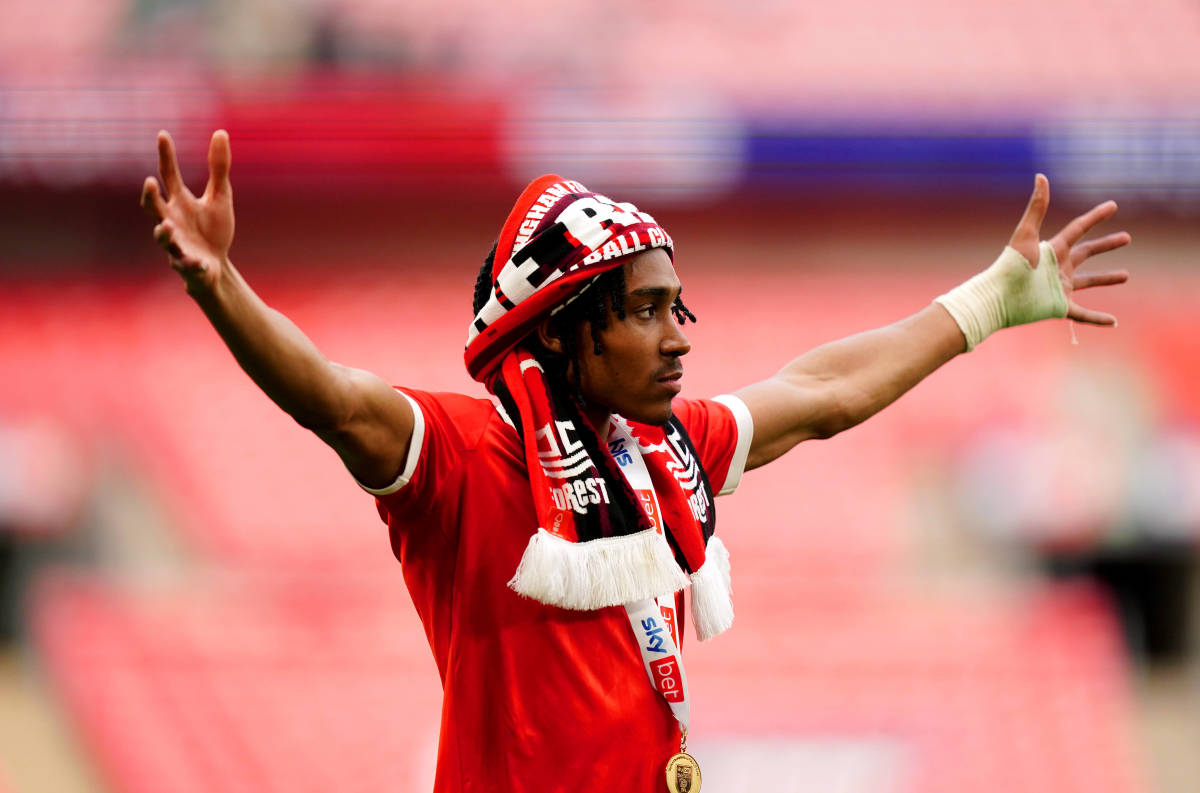 Djed Spence pictured celebrating at Wembley in May 2022 after helping Nottingham Forest win the Championship play-off final