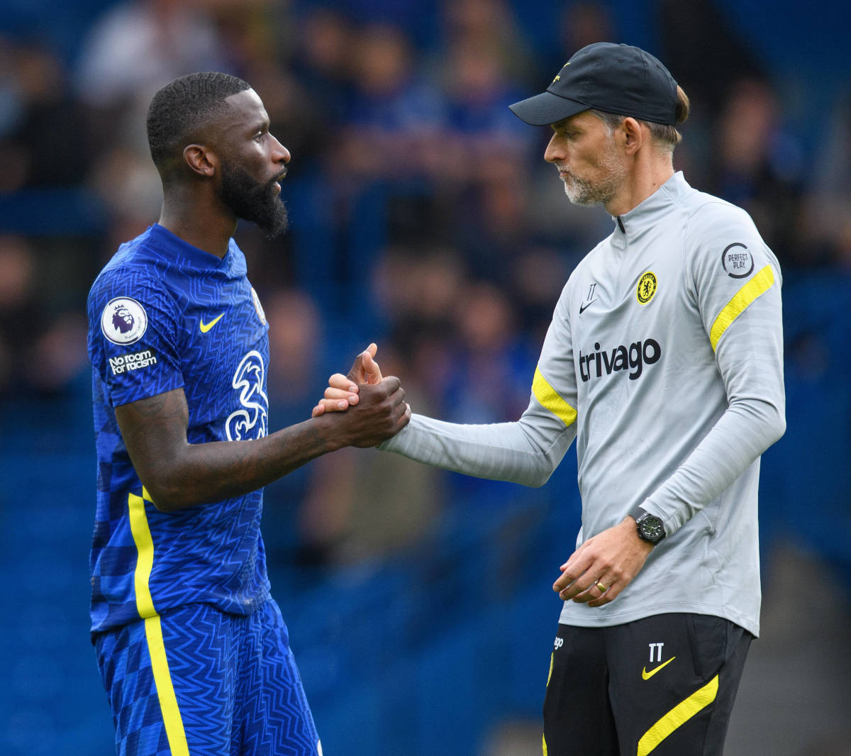 Antonio Rudiger (left) pictured shaking hands with Chelsea manager Thomas Tuchel in September 2021