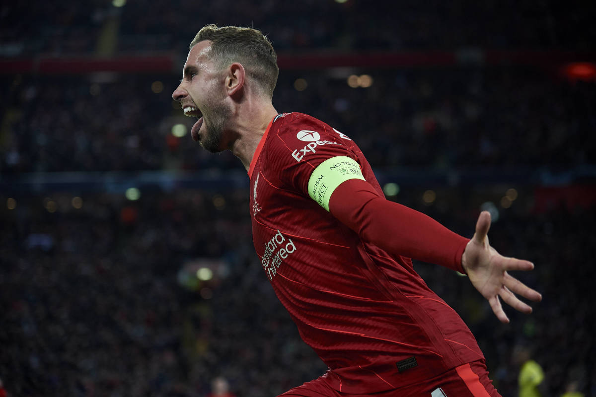 Liverpool captain Jordan Henderson celebrates after his cross deflected off Pervis Estupinan for an own goal by the Villarreal left-back