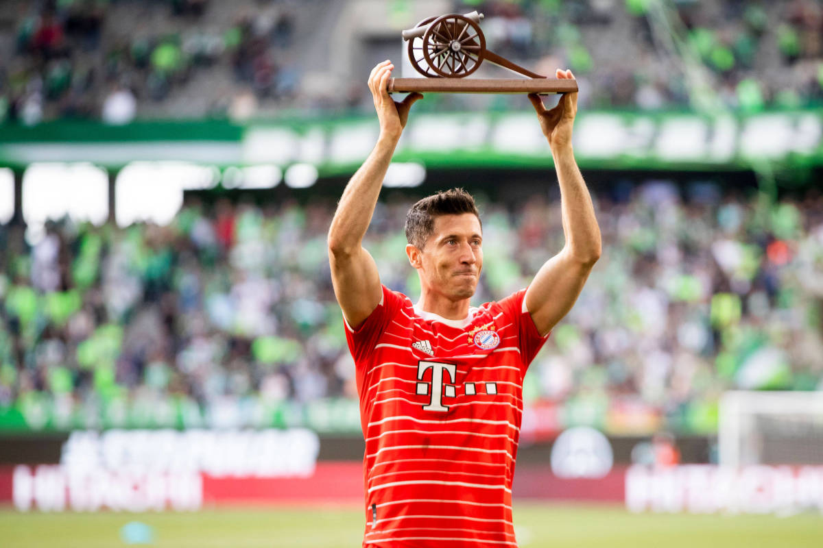 Bayern Munich striker Robert Lewandowski pictured holding up his trophy for winning the 2021/22 Golden Boot in Germany's Bundesliga with 35 goals in 34 games
