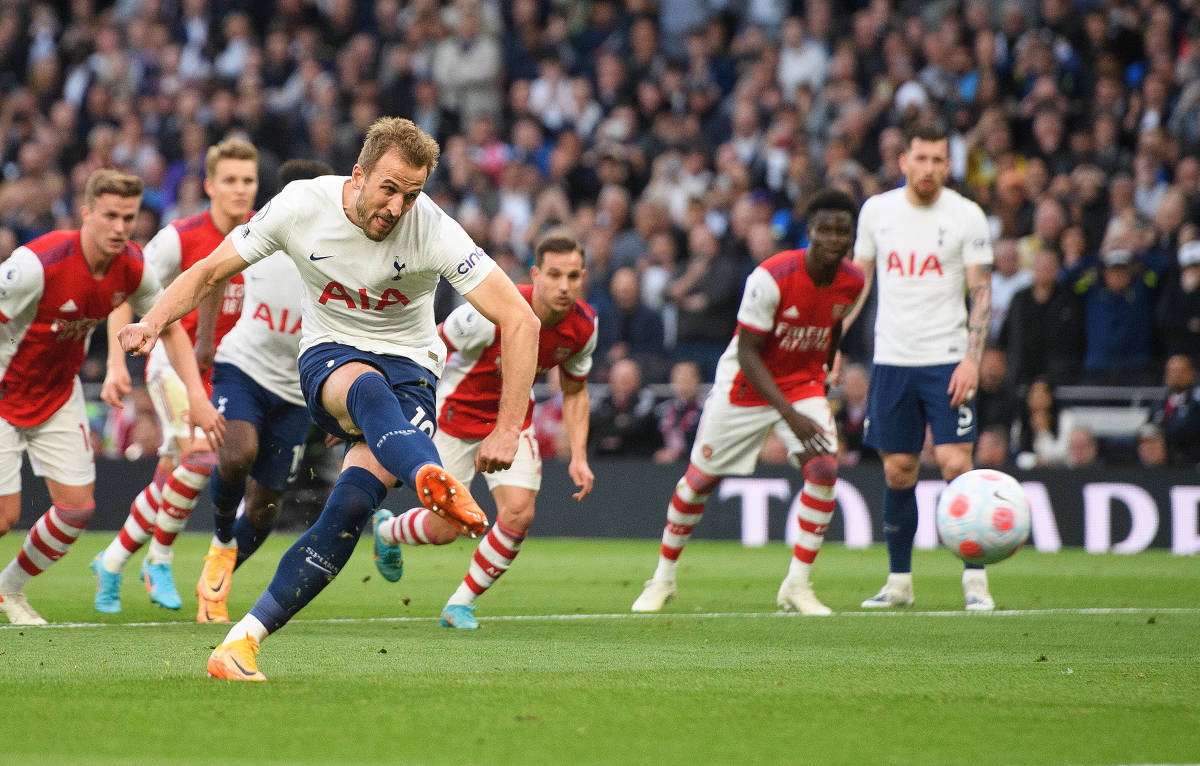 Harry Kane pictured scoring from a penalty kick to give Tottenham a 1-0 lead against Arsenal in May 2022's north London derby