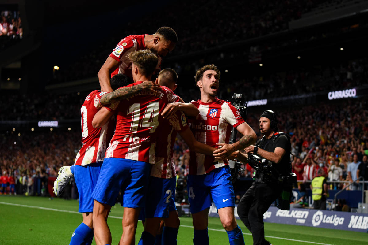 Atletico Madrid players pictured celebrating during their 1-0 win over Real Madrid in May 2022