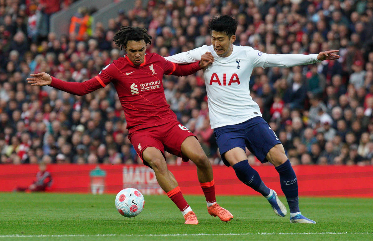 Trent Alexander-Arnold (left) pictured shielding the ball from Son Heung-min during Liverpool's 1-1 draw with Tottenham in May 2022