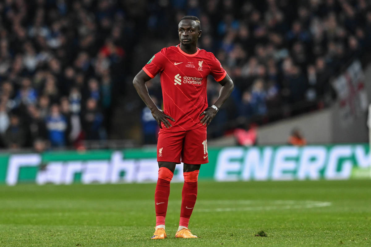 Sadio Mane stands with his hands on his hips during the 2022 EFL Cup final between Chelsea and Liverpool