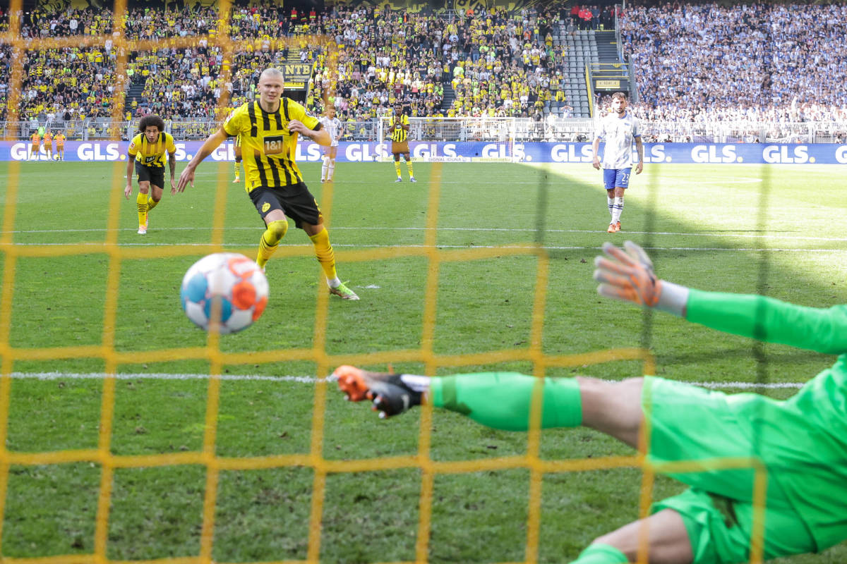 Erling Haaland pictured scoring his final goal for Borussia Dortmund from a penalty kick in their 2-1 win over Hertha Berlin in May 2022