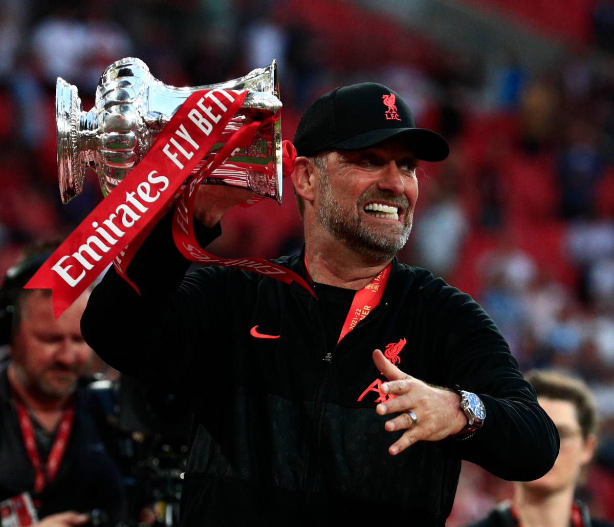 Jurgen Klopp pictured celebrating with the FA Cup trophy after his Liverpool side beat Chelsea in the 2022 final at Wembley