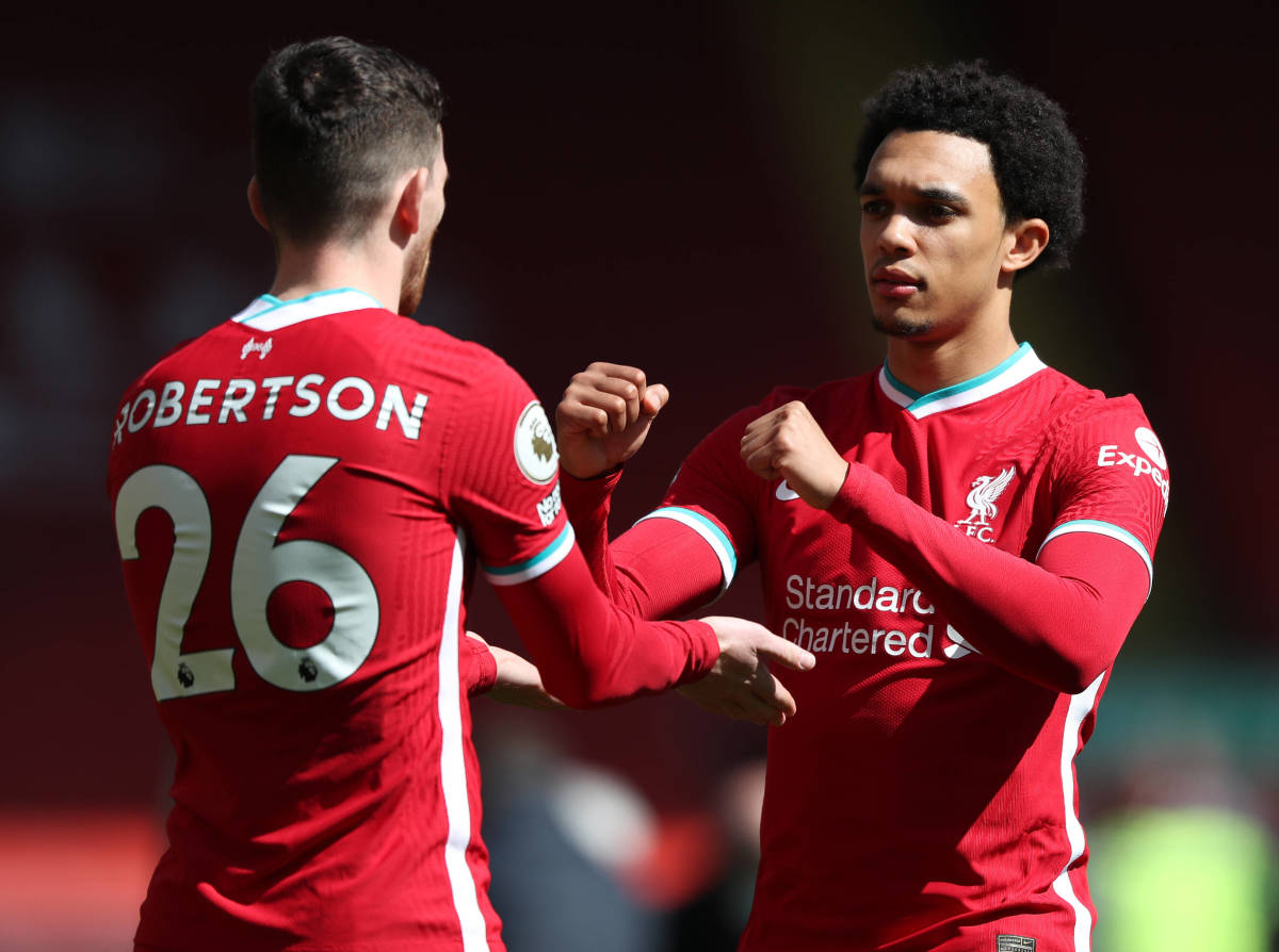 Andy Robertson and Trent Alexander-Arnold pictured playing for Liverpool in 2021