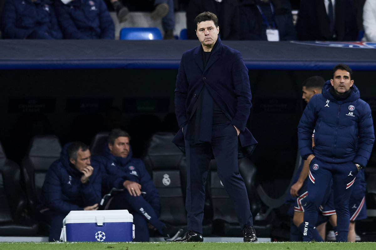 Mauricio Pochettino looks dejected as he watches his PSG side during their 3-1 defeat at Real Madrid