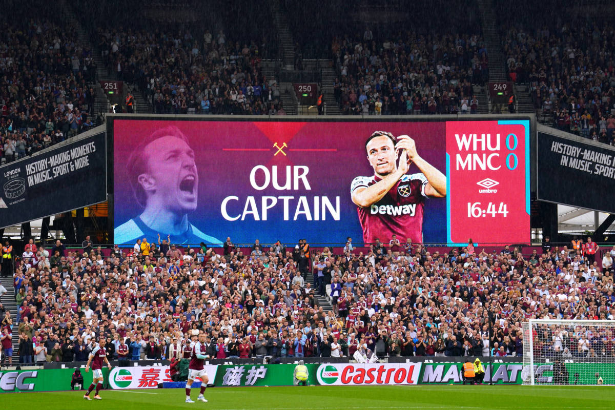 West Ham United fans pay tribute to Mark Noble during his final home game for the club in May 2022