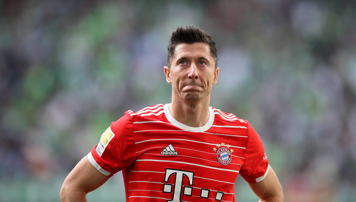 Robert Lewandowski pictured looking emotional as he stands in front of Bayern Munich's fans after the club's final game of the 2021/22 season