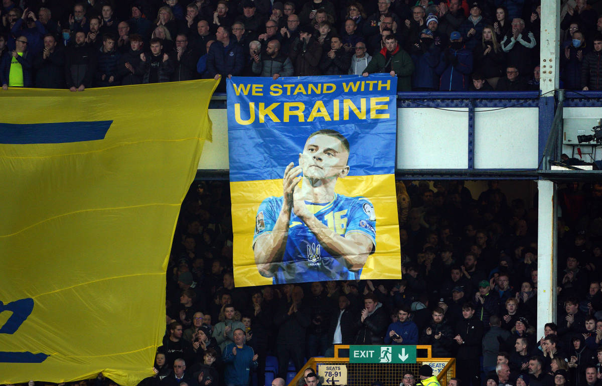 Everton fans hold up banners in support of Ukraine and Vitaliy Mykolenko