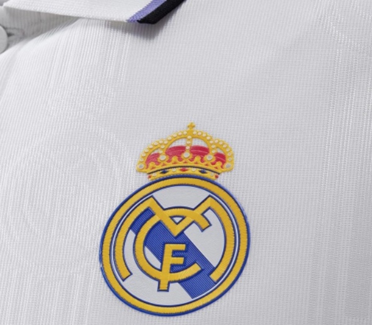 A close-up view of the club crest on Real Madrid's new home jersey for the 2022/23 season