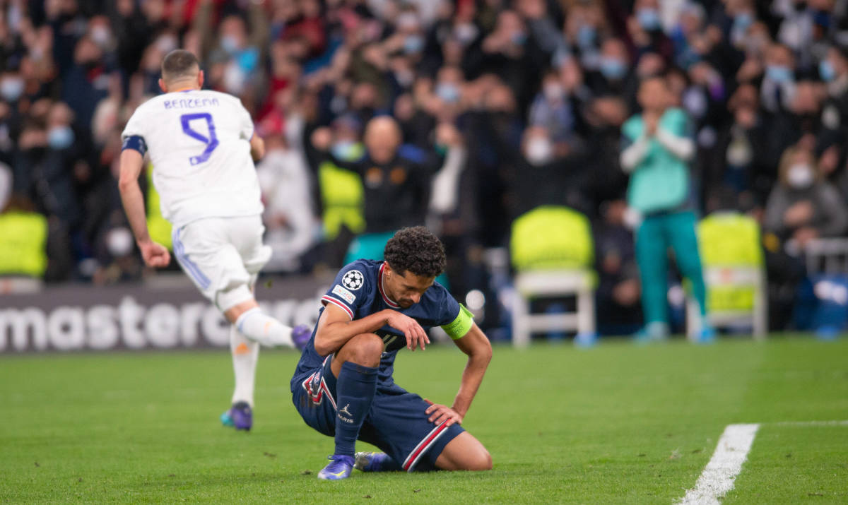 Marquinhos looks dejected after PSG concede a goal to Real Madrid's Karim Benzema