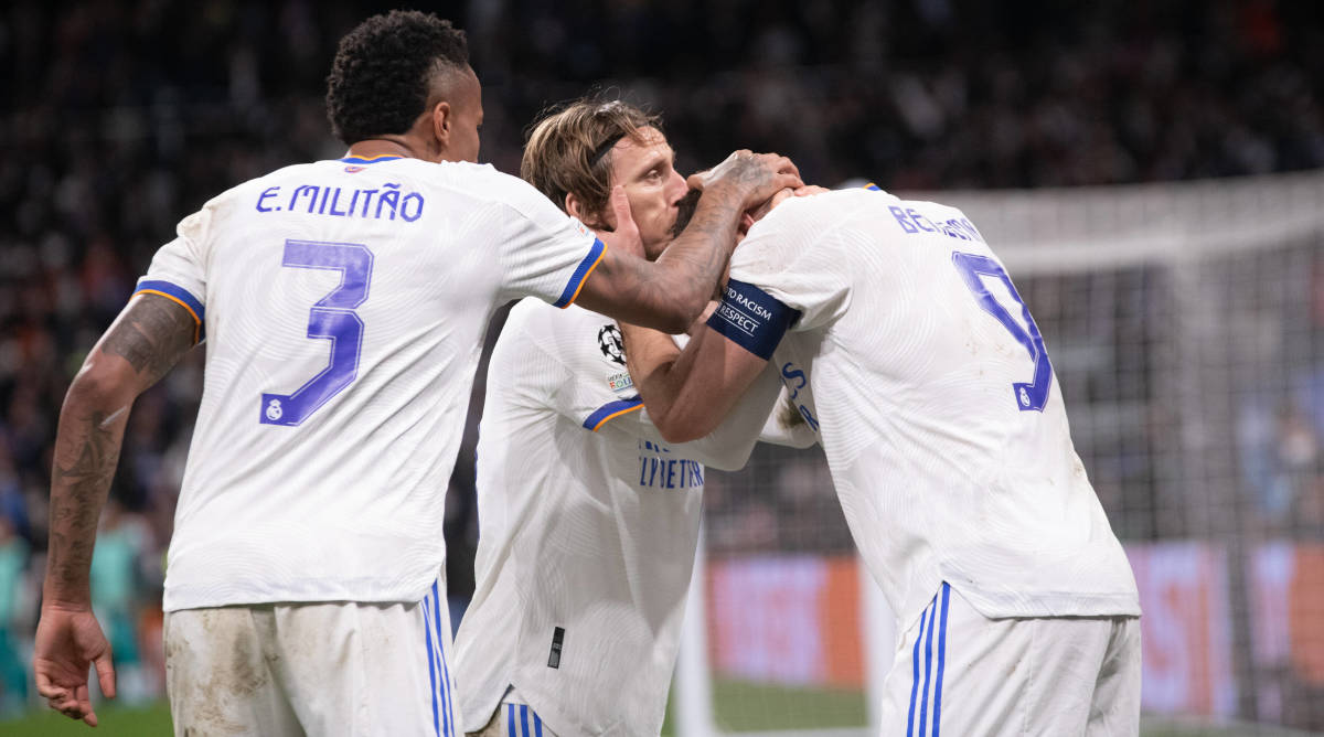 Luka Modric kisses Karim Benzema during Real Madrid's 3-1 win over PSG
