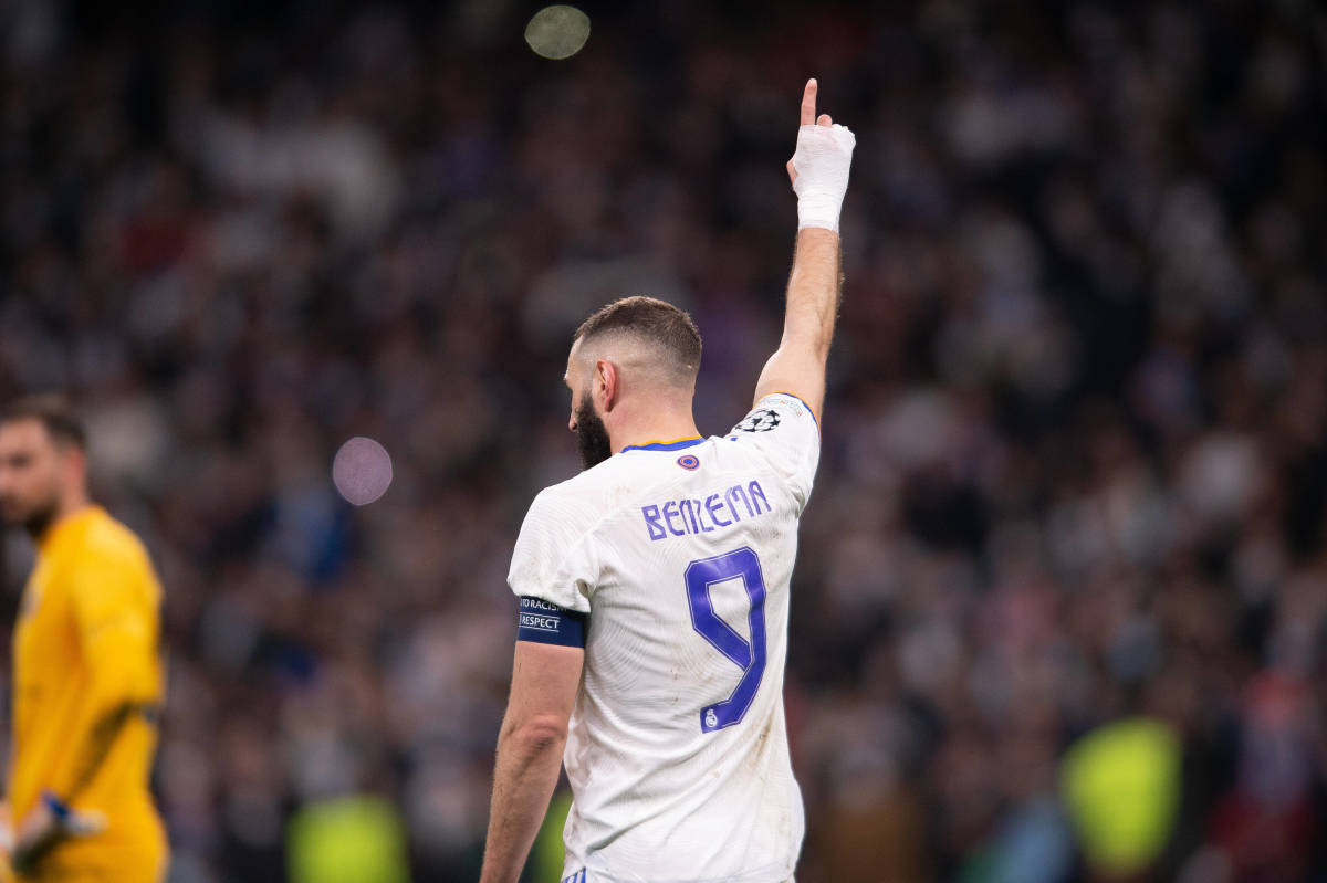 Hat-trick hero Karim Benzema celebrates during Real Madrid's 3-1 win over PSG