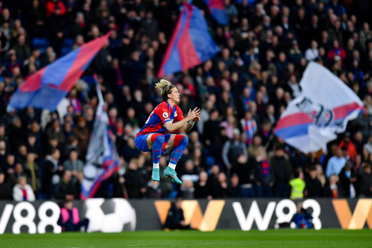 Conor Gallagher pictured jumping ahead of Crystal Palace's Premier League fixture against Leeds United in April 2022