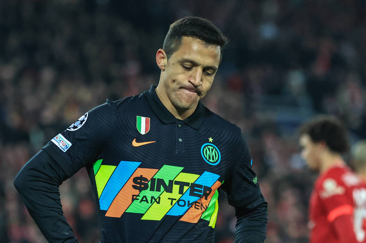 Inter Milan's Alexis Sanchez looks dejected after being sent off at Liverpool