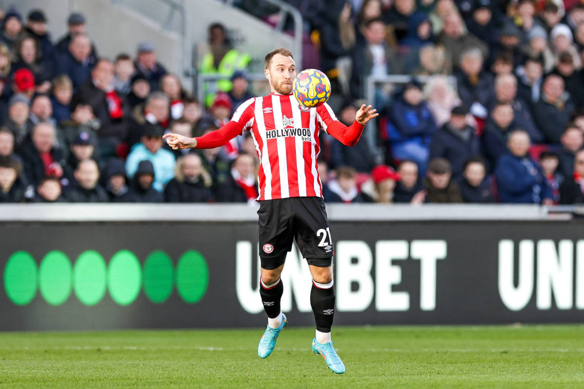 Christian Eriksen controls the ball on his Premier League debut for Brentford