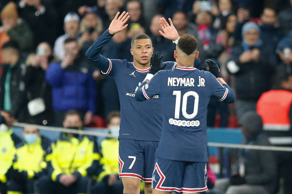 Kylian Mbappe pictured (left) celebrating a goal for PSG with teammate Neymar in April 2022