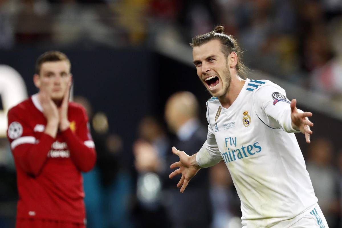 Gareth Bale pictured (right) celebrating a goal during Real Madrid's 3-1 win over Liverpool in the 2018 Champions League final