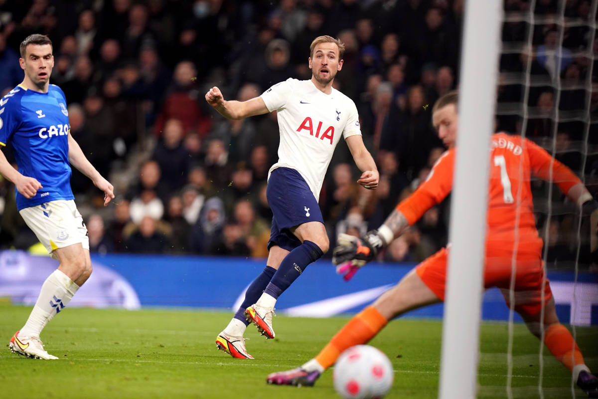 Harry Kane shoots past Everton's Jordan Pickford to score his 176th Premier League goal for Tottenham