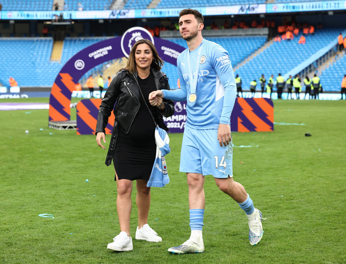 Center-back Aymeric Laporte pictured celebrating with girlfriend Sara Botello after winning the 2021/22 Premier League title with Manchester City