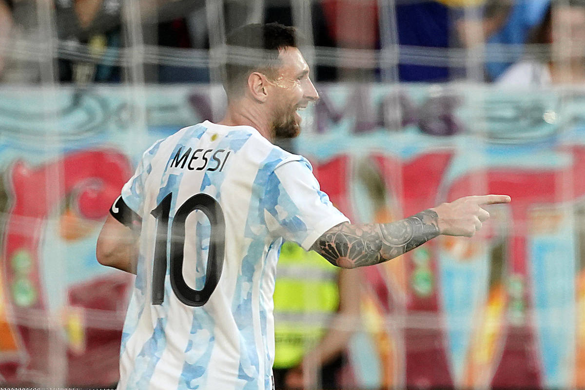 Lionel Messi pictured celebrating after scoring one of his FIVE goals for Argentina against Estonia in June 2022