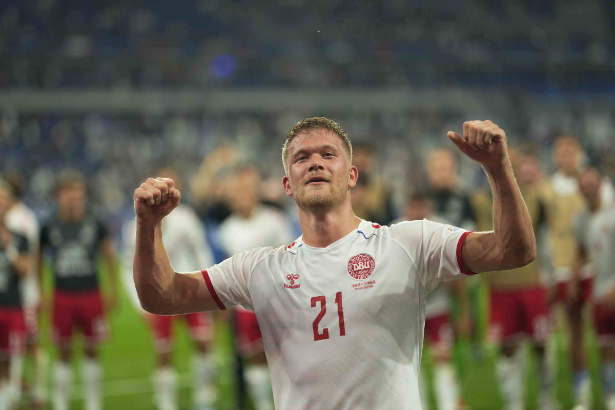 Andreas Cornelius celebrates after scoring twice to help Denmark beat France in the UEFA Nations League in June 2022